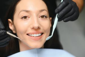 patient receiving professional cosmetic dentistry evaluation for a brighter smile
